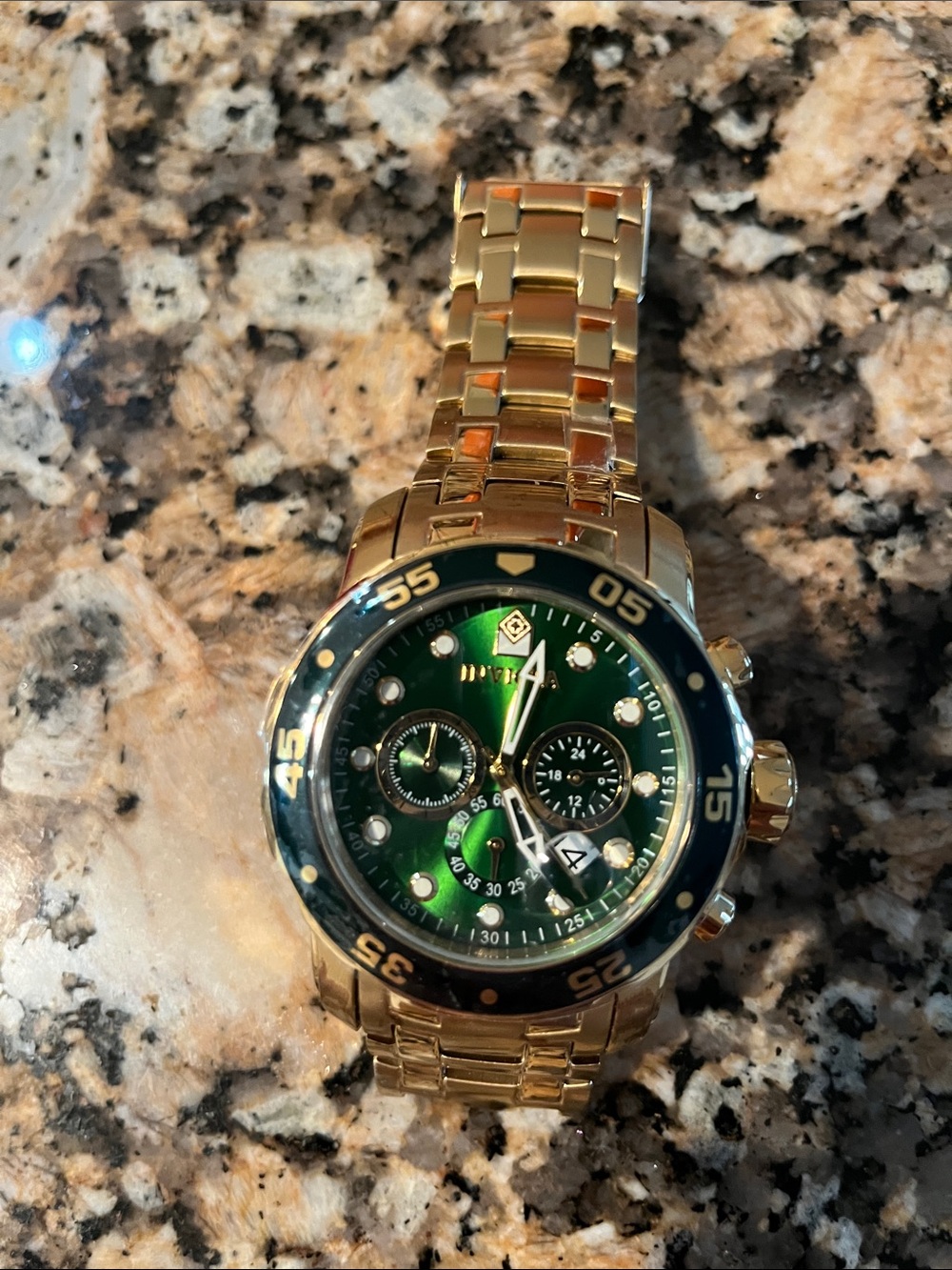 Invicta Gold Tone Chronograph Watch with Green Dial